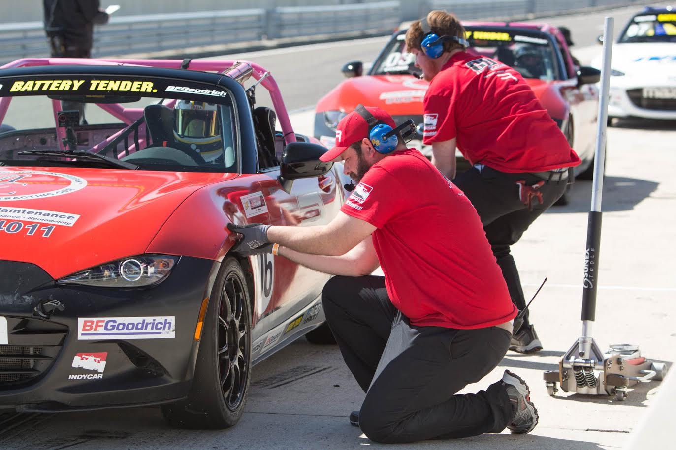 The Racing Analytics team making adjustments while testing.