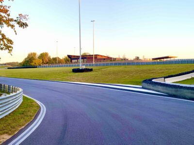 A glimpse of the clubhouse through the winding curves on track.
